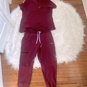 LAGO brand large top and medium joggers.